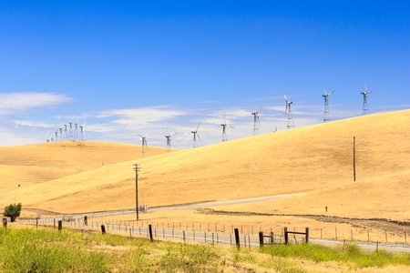 Wind turbine generators generating electric power through Patterson Pass in Californiaの写真素材