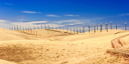 Wind turbine generators generating electric power through Patterson Pass in California