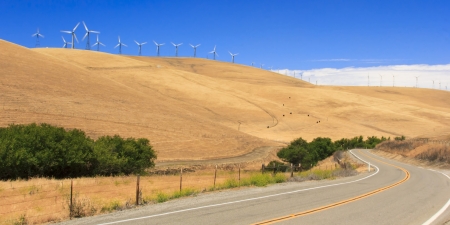 Wind turbine generators generating electric power through Patterson Pass in Californiaの写真素材