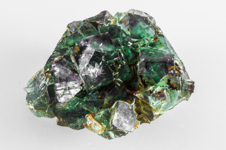 Fluorite is a very popular mineral, and it naturally occurs in all colors of the spectrum.  This rock is primarily green and purple.の写真素材