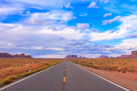 Highway 163 approaching Monument Valley in southeastern Utah.の写真素材