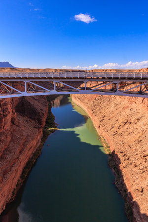 Navajo Bridge crosses the Colorado River's Marble Canyon near Lee's Ferry in the U.S. state of Arizona.の写真素材