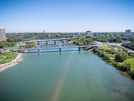 Aerial view of the Broadway and Traffic Bridges crossing the South Saskatchewan River in Saskatoon.の写真素材