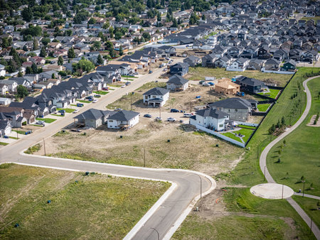 Aerial view of Kensington in Saskatoon, Saskatchewan, showing new homes, ponds, and community parks.の写真素材