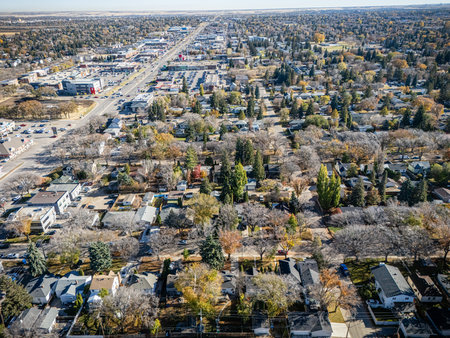 Aerial view of Haultain in Saskatoon, Saskatchewan, with colorful fall trees and residential streets.の写真素材