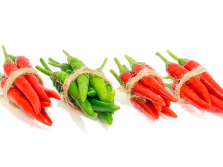 bundle difference color red and green chilisの写真素材