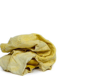 a ball of Chamois yellow soft leather on white backgroundの写真素材