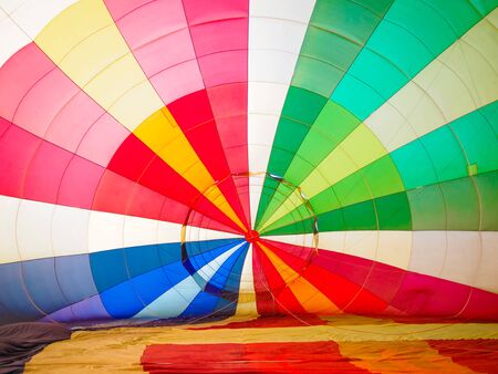 Multi colored hot air balloon view from insideの写真素材
