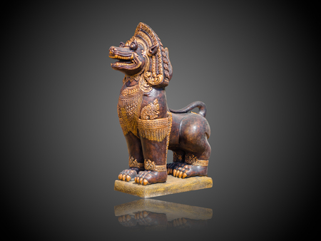 Asian Imperial Lion Statue isolate on gradient Black and white backgroundの写真素材