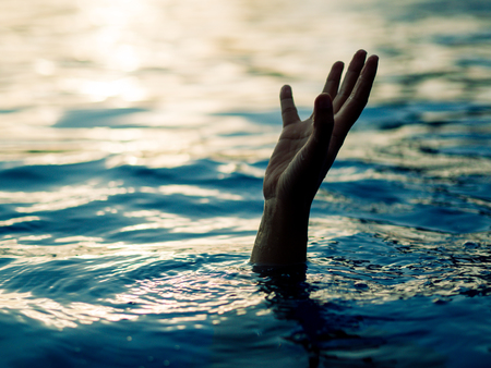 Drowning victims, Hand of drowning man needing help. Failure and rescue concept.の写真素材