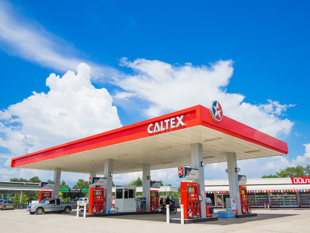 Trang, Thailand - September 2, 2017: Caltex gas station blue sky background. Caltex is a petroleum brand name of Chevron Corporation used in more than 60 countries.のeditorial素材