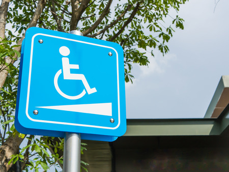 Wheelchair symbol in a parking lot.の写真素材