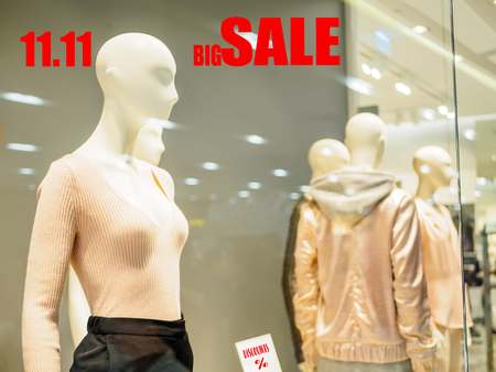 Window display with red sale words for 11.11 Chinese single day sale concept.