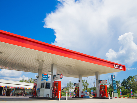 Trang, Thailand - September 2, 2017: Caltex gas station blue sky background. Caltex is a petroleum brand name of Chevron Corporation used in more than 60 countries.のeditorial素材