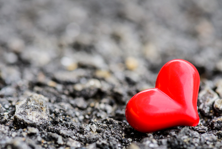 Abstrack red heart on dark background. Love, person and valentine concept.の写真素材