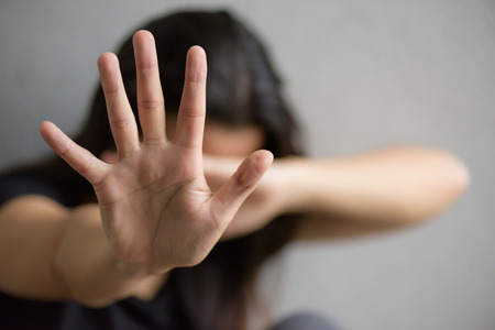 Woman hand sign for stop abusing violence, Human Rights Day concept.