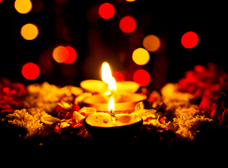 Candle light with dark and bokeh  background for Hanukkah holiday celebrated.の写真素材