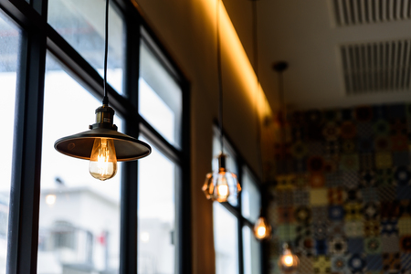 Closeup vintage or retro decoration lamp in the restaurant.の写真素材