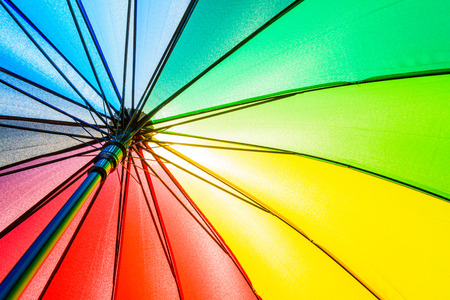 Bottom view of Rainbow umbrella texture background.の写真素材