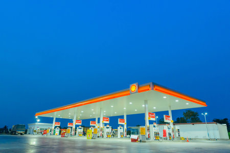 Chachoengsao, Thailand - Jan 28, 2018: Shell gas station blue sky background during sunset. Royal Dutch Shell sold its Australian Shell retail operations to Dutch company Vitol in 2014のeditorial素材