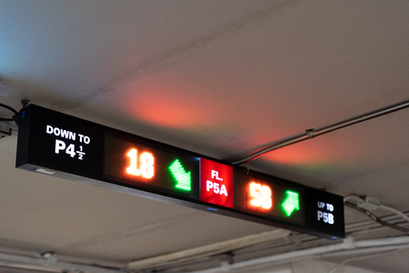 Board shows the direction transport for car parking in the shopping mall.の写真素材