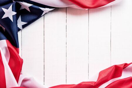 Top view of Flag of the United States of America on white wooden background. Independence Day USA, Memorial.の写真素材