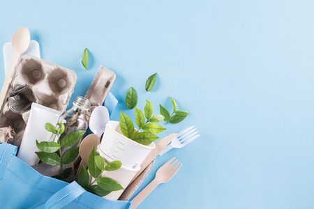 Different garbage materials on blue background. Recycle, World Environment Day, go green and Eco...