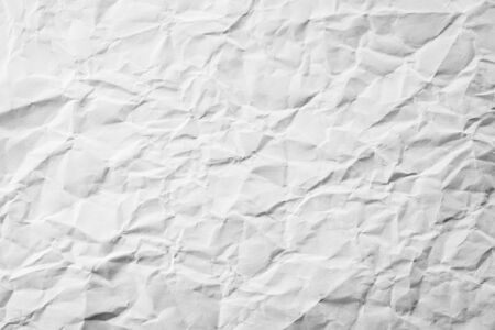 Texture of crumpled white paper. Creative vintage for design background.の写真素材