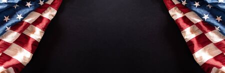 Happy Independence Day. American flags against a black  background. July 4.の写真素材