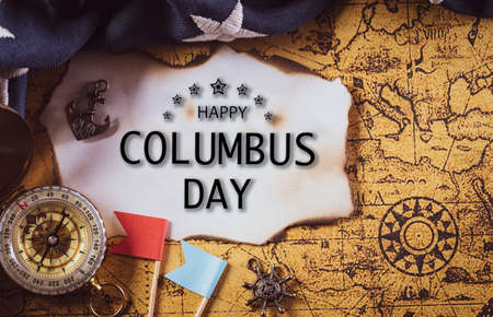 Happy Columbus Day concept. Vintage American flag with compass and retro treasure manuscript.  Flat lay, top view with Columbus day textの写真素材