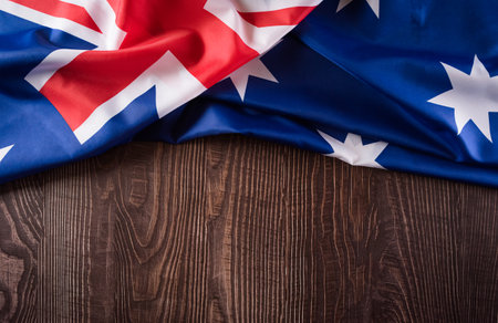 Happy Australia day concept. Australian flag against old wooden background. 26 January.の写真素材