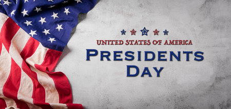 Happy presidents day concept with flag of the United States on old stone background.の写真素材