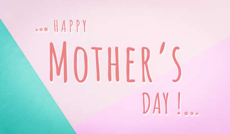 Top view of pastel colours paper background pattern with Happy Mother's Day text concept.の写真素材