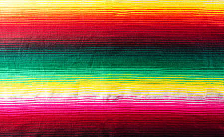 Cinco de mayo background decorated image made from mexican blanket stripes or poncho serape background.の写真素材