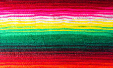 Cinco de mayo background decorated image made from mexican blanket stripes or poncho serape background.の写真素材