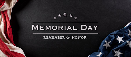 Happy memorial day concept made from vintage american flag with text on black wooden background.の写真素材