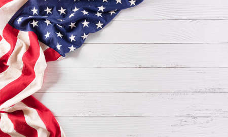Happy memorial day concept made from vintage american flag on white wooden background.の写真素材