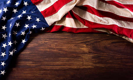 Happy memorial day concept made from vintage american flag on old wooden background.の写真素材