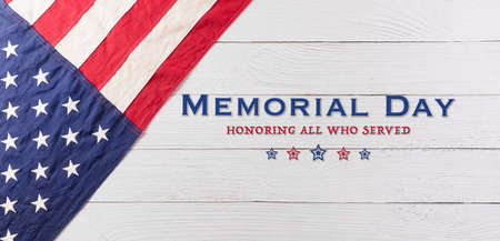 Happy memorial day concept made from american flag with text over white wooden background.の写真素材