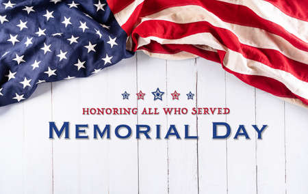 Happy memorial day concept made from american flag with text over white wooden background.の写真素材