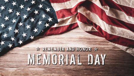 Happy memorial day concept made from vintsge american flag on old wooden background.の写真素材