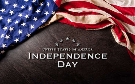 Happy Independence day: 4th of July, American flag on dark stone background with the text.の写真素材