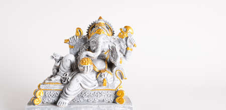 Happy Ganesh Chaturthi festival, Lord Ganesha statue with beautiful texture on white background, Ganesh is hindu god of Success.の写真素材