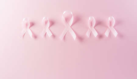 Pink ribbons on pastel background, Symbol of women's breast cancer awareness, Health care and medical concept.の写真素材