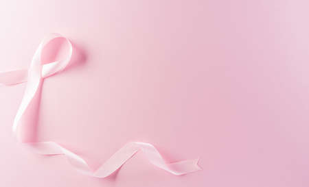 Pink ribbons on pastel background, Symbol of women's breast cancer awareness, Health care and medical concept.の写真素材
