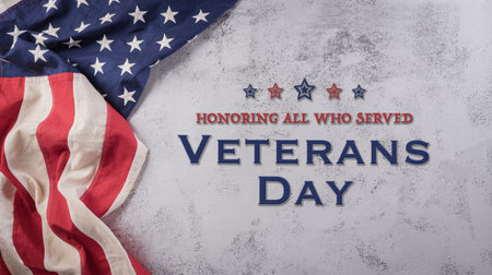 Happy Veterans Day concept. American flags against a dark stone  background. November 11.の写真素材