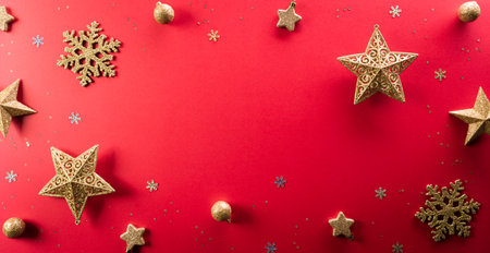 Christmas and new year background concept. Top view of Christmas  ball, star and snowflake on red background.の写真素材