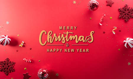 Christmas and new year background concept. Top view of Christmas  ball and snowflake on red background.の写真素材