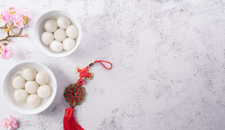 Tang Yuan(sweet dumplings balls), a traditional cuisine for Mid-autumn, Dongzhi (winter solstice ) and Chinese new year. Chinese characters FU in the article refer to fortune, wealth, money flow.の写真素材