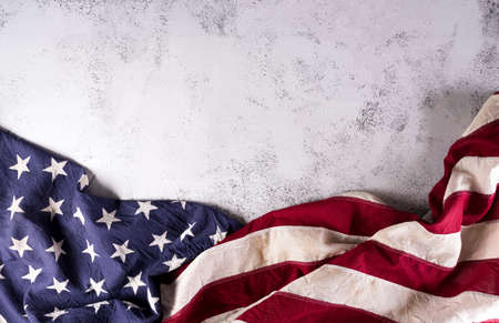 Happy presidents day concept with flag of the United States on dark stone background.の写真素材
